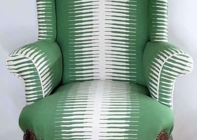 Green and cream zebra stripe armchair